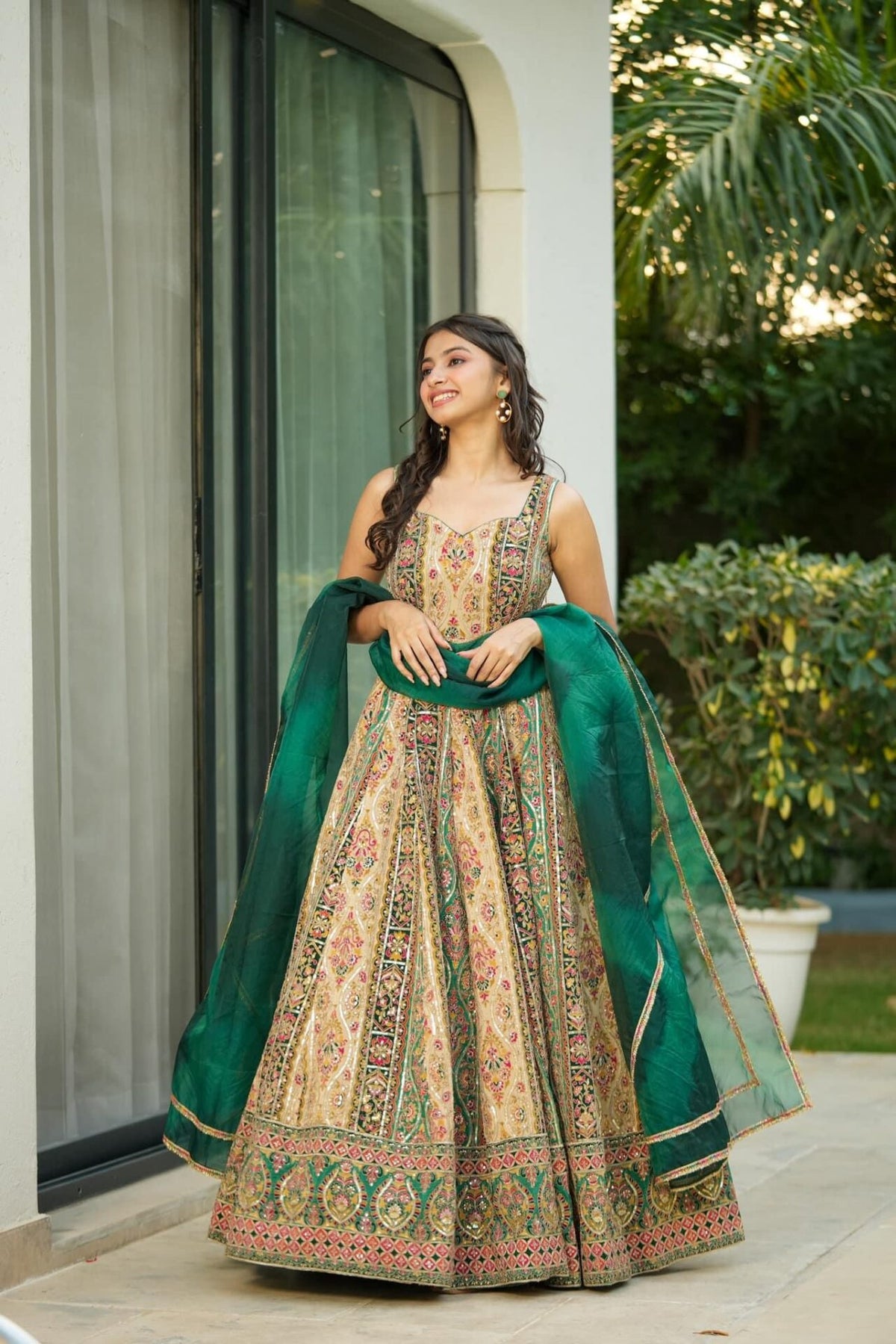 Triveni green heavy embroidered maxi