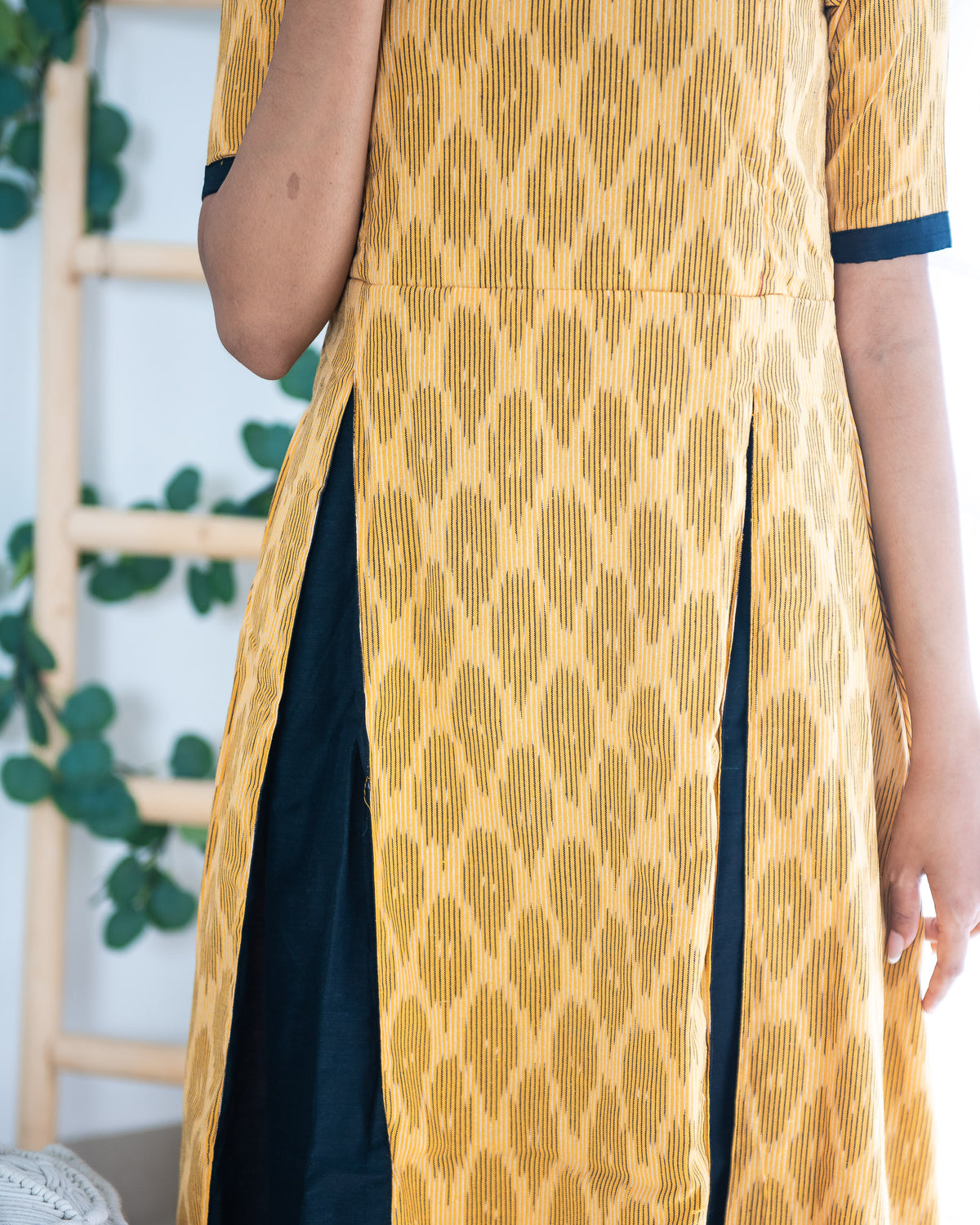 Abheri – A Mustard & Black Ikat Dress